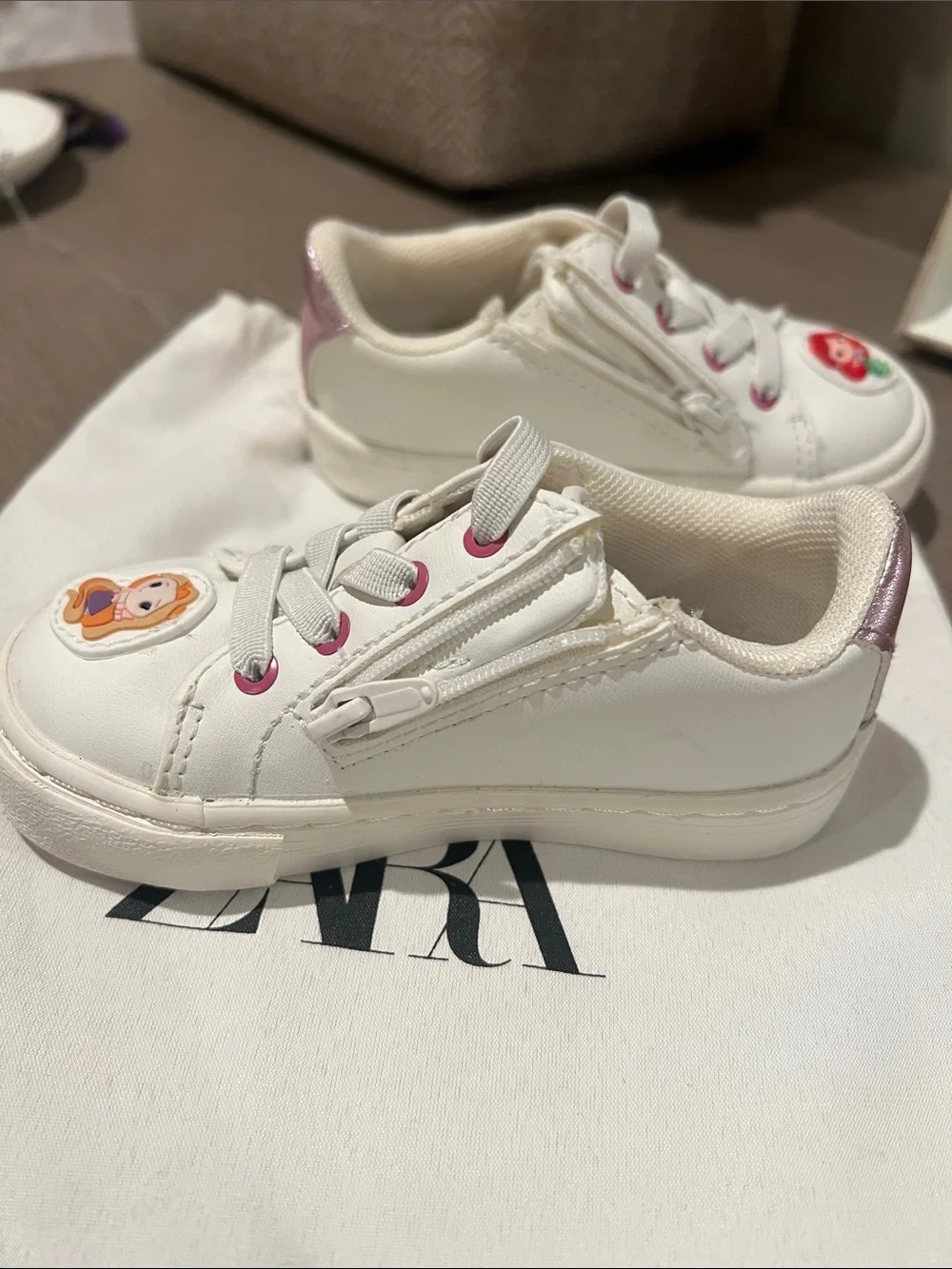 Zara Disney Princess White Sneakers with Princess Patches and side zip closure.